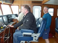 07 Erwin steers the&nbsp;boat