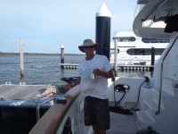 11 Gelcoat Jeff applies oil to the teak rail