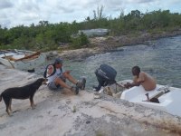 2012-06-05 Kim talks to a local while Wills looks&nbsp;on