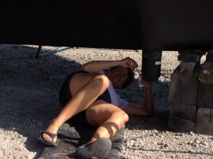 01 Kathy uses special "Transducer Paint" on the sonar transducer