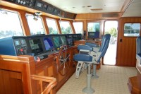 20 Pilothouse with wheel on – see cabinet behind wheel