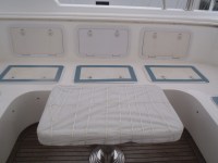 25 Flybrige settee – cushions removed, hatches taped and table cover&nbsp;secured