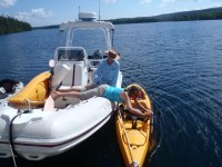 Atle watches while Kristina readies her&nbsp;kayak
