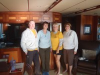 Bradley and Kathy with Kathy and Nancy who rowed out to meet&nbsp;us