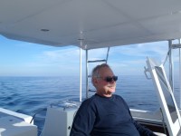 Gary enjoys the flybridge with calm seas