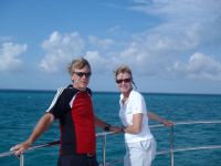 Dick and Darin watch the dolphins on the&nbsp;bow