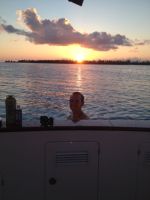 Gary enjoys a shower at sunset