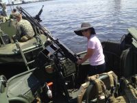 Kathy tests the gun on a naval assault boat – this might stop a polar&nbsp;bear!