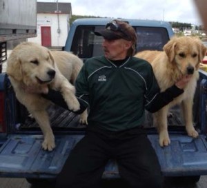 Reg and his dogs in Makkovik