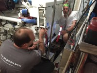 Keith and Bradley work on engine&nbsp;maintenance