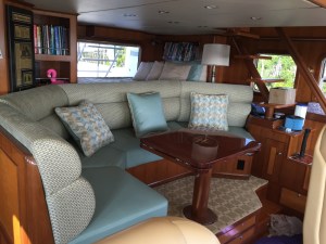 New Pilothouse settee and bunk coverings with re-finished table