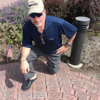 Bradley with his father’s commemorative&nbsp;brick
