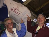 Wendy and Austin add their names to out T-shirt at Pete’s Pub (put there last&nbsp;year)